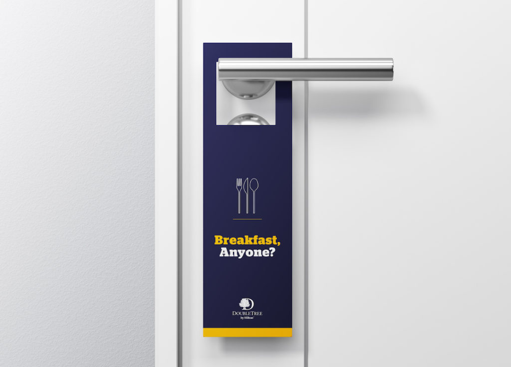 Doubletree by Hilton Door Hangers in blue and yellow